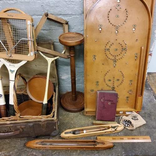 142 - A Chad Valley Bagatelle board;  a Caravelle tennis racket; another, Dunlop;  an early 20th century s... 