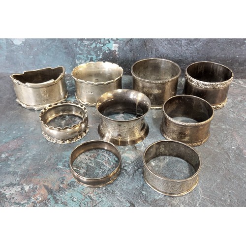 235 - Late Victorian and later silver napkin rings, 192g (8)