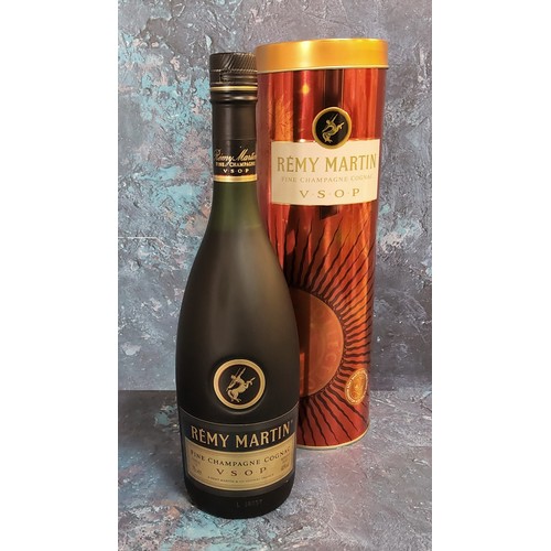 59 - A bottle of Remy Martin Fine Champagne Cognac V.S.O.P. 70cl, unopened,in original cylindrical tube