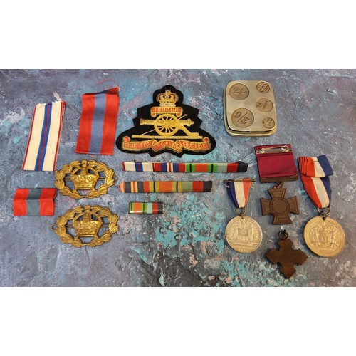 269 - Militaria- A replica Victoria Cross for reenactment purposes, marked COPY to verso; a bronze Victori... 