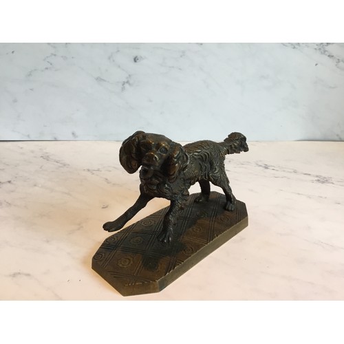 291 - French School, early 20th century, gilt bronze, model of a Spaniel, canted square base, 8.5cm high, ... 