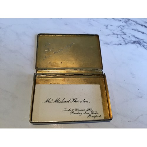 300 - A George V silver rectangular card case, engine turned, gilt interior, 7cm wide, Birmingham 1930