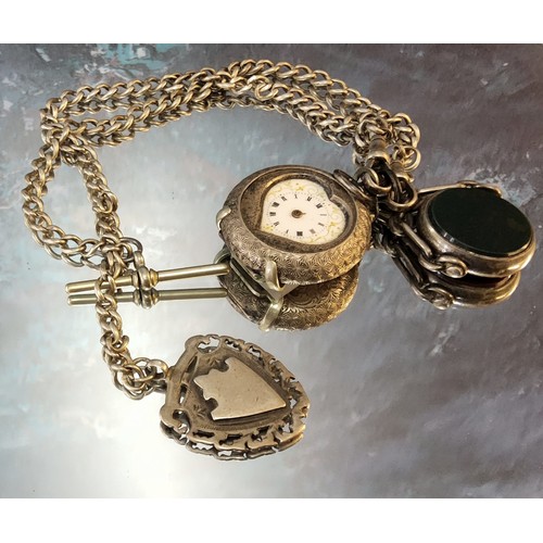 372 - A continental silver lady's open faced fob watch, unusual heart shaped dial aperture, import marks (... 