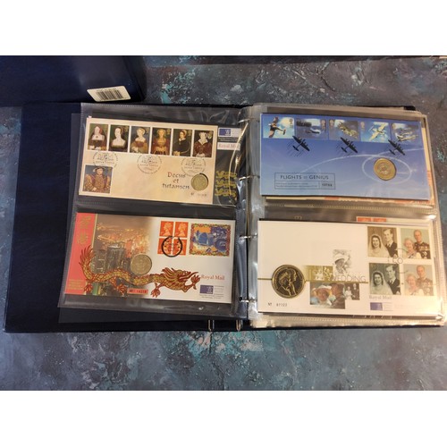 343 - Coins & Stamps - A Royal Mail/Royal Mint Philatelic Numismatic covers album complete with slip c... 