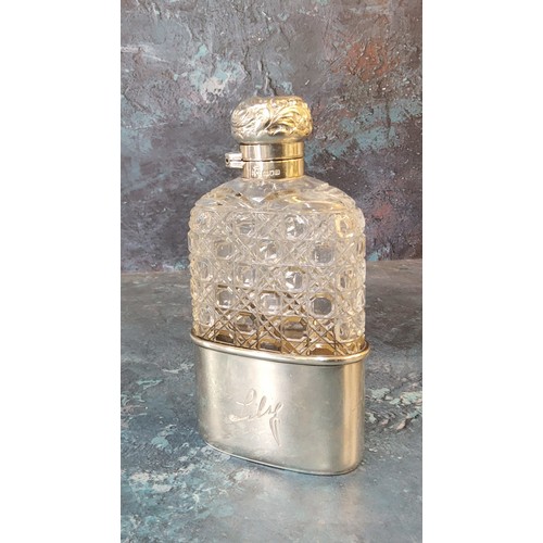 299 - A silver and hobnail cut glass hip flask, detachable cup, hinged domed cover, embossed with scrolls,... 