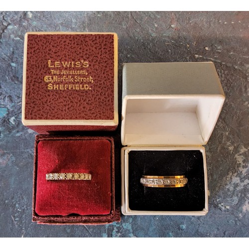 373 - A 9ct white & yellow gold full eternity ring set with round white stones, size N, H Samuel, Birm... 