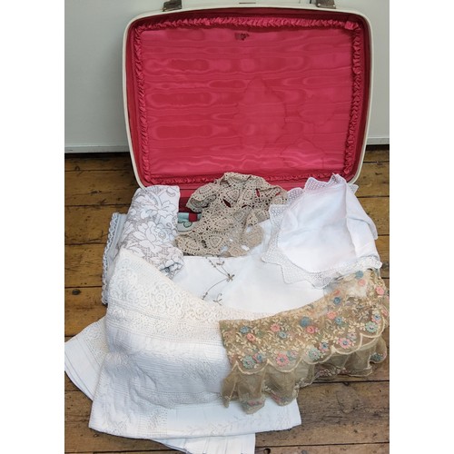 393 - Linen & Lace - an Edwardian lace shawl; table cloths; etc;  an Antler suitcase, c.1950