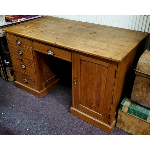 625 - An early 20th century pitch pine pedestal desk, later top, with 1920's cup handles, holding one draw... 