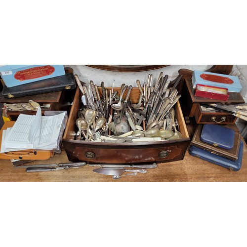 642 - A large quantity of flatware, some cased;  carving set;  etc