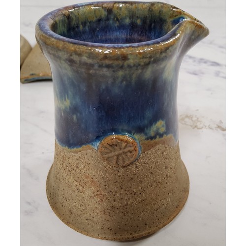 125 - A Studio Pottery rectangular garlic scrapper, mottled blue glaze, 12.5cm wide, impressed mark; ... 