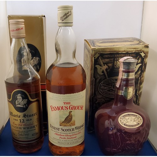 142 - Marie Stuart 12 Year Old  Scotch Whisky, boxed;  The Famous Grouse whisky, 1 litre;  ... 