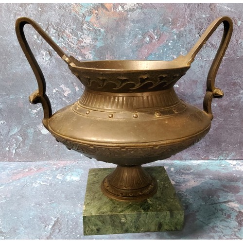 175 - A 19th century Grand Tour bronze mantel urn, cast with stylised foliage, high handles, square green ... 