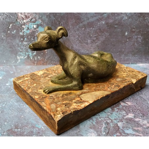 189 - A 19th century green patinated bronze model, of a reclining greyhound, rectangular marble base, 14cm... 