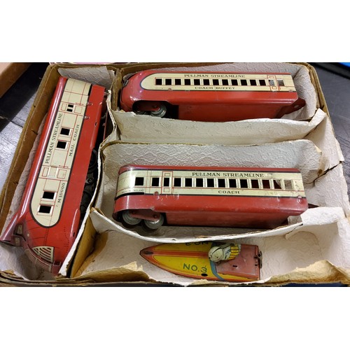 240 - Electric Streamlined Train Set,  locomotive, two coaches made in England, Engine made in USA, base o... 