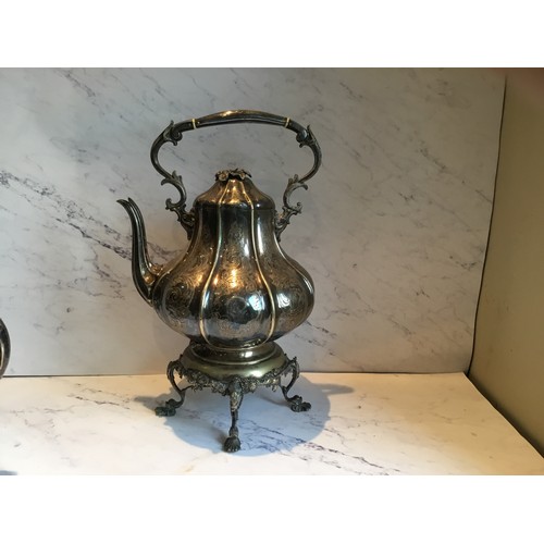 283 - A Victorian part E.P.N.S. tea service, of fluted baluster form, comprising tea kettle on stand, coff... 