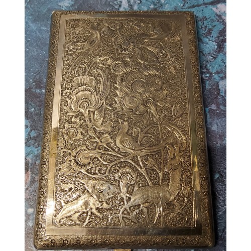 301 - An Islamic silver coloured metal bowed rectangular card case, engraved overall with animals, birds a... 