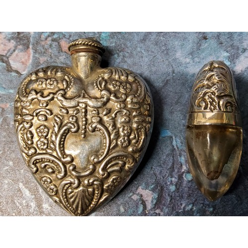 315 - A continental silver heart shaped scent flask, embossed overall, 4.25cm high, 20.5g;  another, ... 