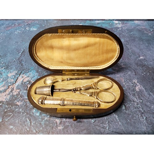 351 - A Victorian oval sewing  necessaire, the interior fitted with silver thimble, scissors, bodkin ... 