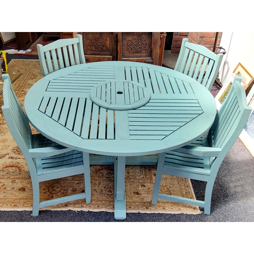 404 - An English teak garden patio table and four armchairs, made by Lister, painted sage green, central l... 