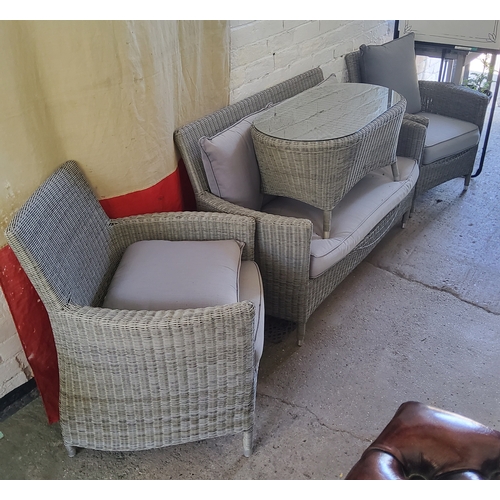 418 - A modern woven wicker effect conservatory suite comprising of a two seater sofa, two armchairs and a... 