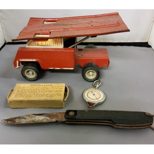 278 - A Tin Plate  Escuderia Sansun truck, red livery;   a pen knife;   a map mea... 