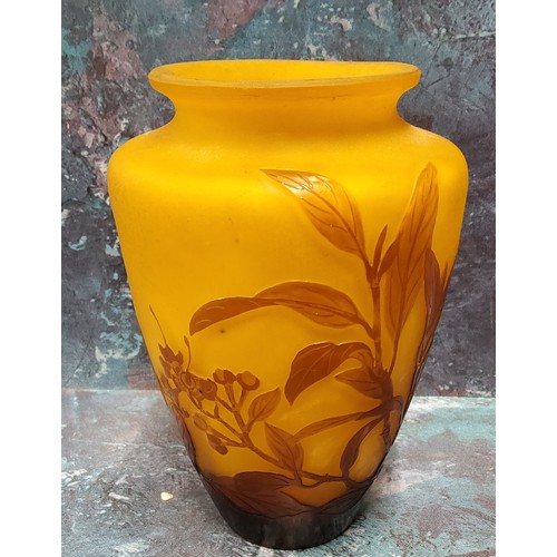 14 - An Art Glass ovoid vase, etched with honeysuckle, on a light orange ground, bears signature Galle, 1... 