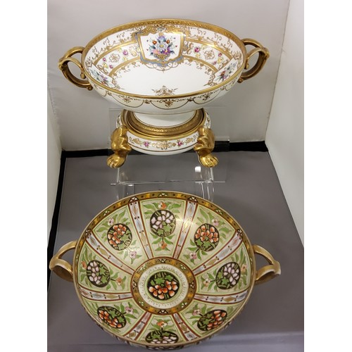 41 - A Noritake pedestal two-handled comport, decorated with roundels and panels, picked out in green, bl... 