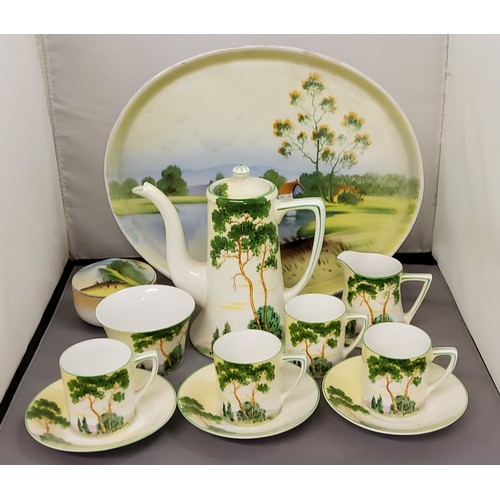 62 - A Noritake coffee service, for four, comprising coffee pot, sugar bowl and milk jug, four coffee can... 