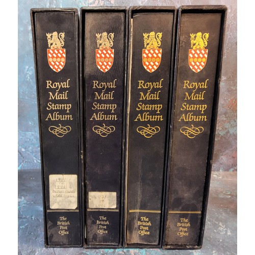 65 - Philately - Four Royal Mail Stamp Albums by The British Post Office,  one comprehensive, two part co... 