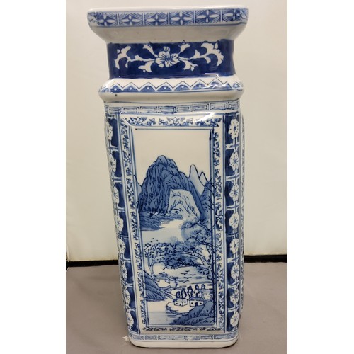 130 - A modern Chinese blue and white panelled square vase, each side decorated with a monumental landscap... 