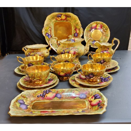 135 - An Aynsley Orchard Gold pattern tea service, comprising teapot and cover, milk jug, sugar bowl, six ... 