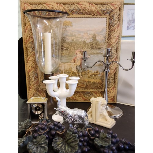 189 - A 20th century storm lantern;  a Swedish Guldkroken five light white glazed candelabrum;  another, c... 