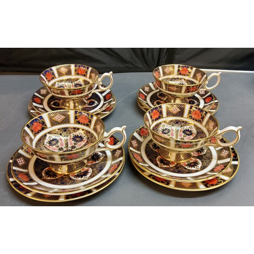 121 - A set of four Royal Crown Derby 1128 pattern pedestal teacups and saucers, printed marks