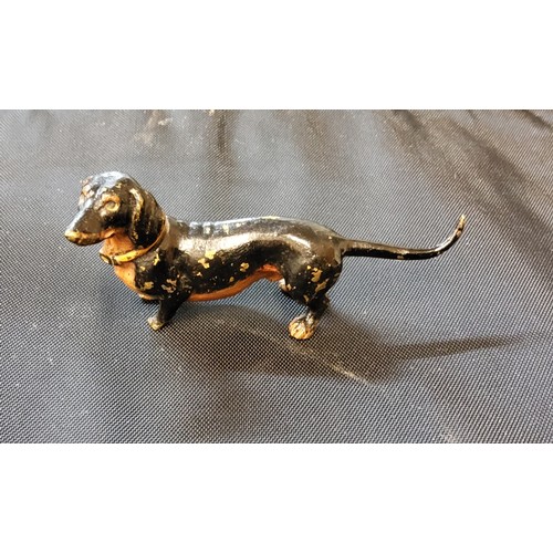 295 - Austrian School, a cold painted bronze, of a Dauschund, 8cm lomg