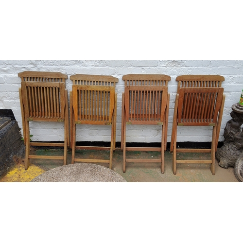 760 - Four teak garden chairs