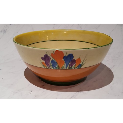 8 - A Clarice Cliff Crocus pattern bowl, typically painted with flowers, banded in tan and green, 18.5cm... 