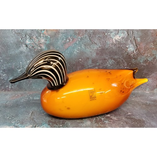 18 - A Murano glass duck, with black and white striped head, mottled orange body, 30cm long, label Vetri ... 