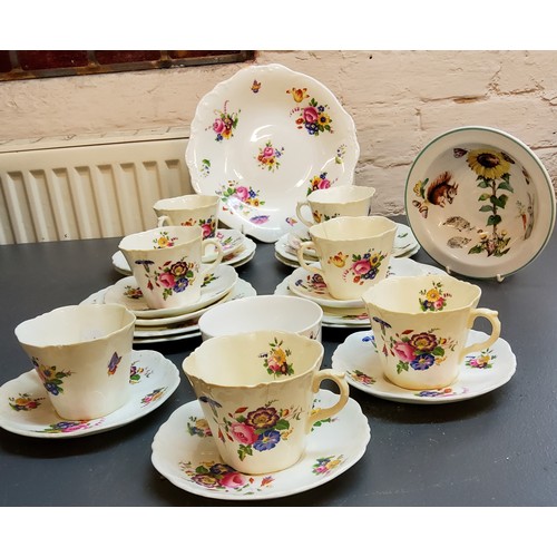 78 - A Cauldron China tea service, comprising plates, six cups, eight saucers and side plates, decorated ... 