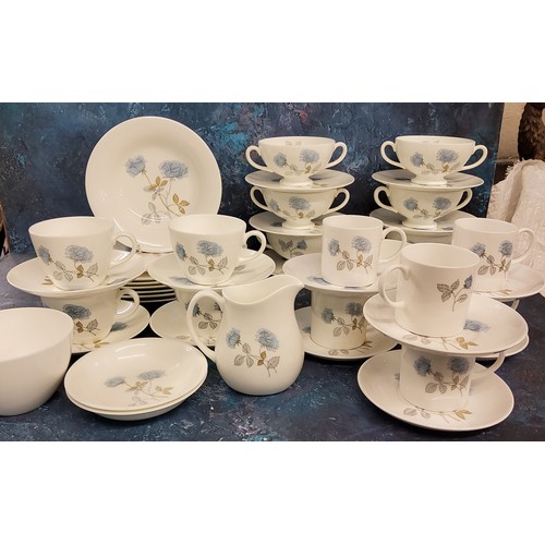 176 - A Wedgwood Ice Rose part dinner, coffee and tea service, comprising six coffee cups and saucers, sev... 