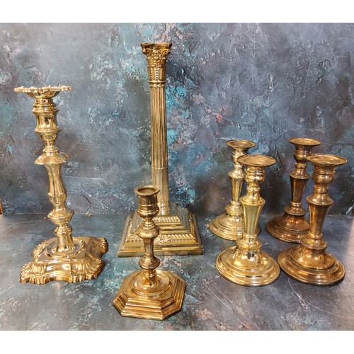 168 - A plated Corinthian column candlestick, stop fluted column, step bae,  37cm high;  a George II style... 