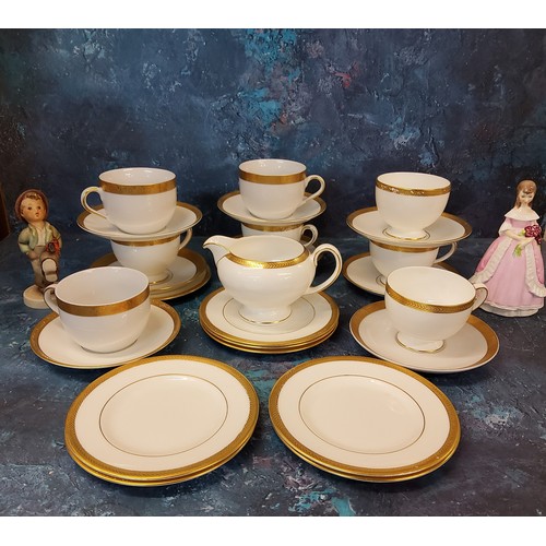 21 - A Royal Worcester figure, Modesty, crown and circle mark;   a Wedgwood tea service, banded in gilt, ... 