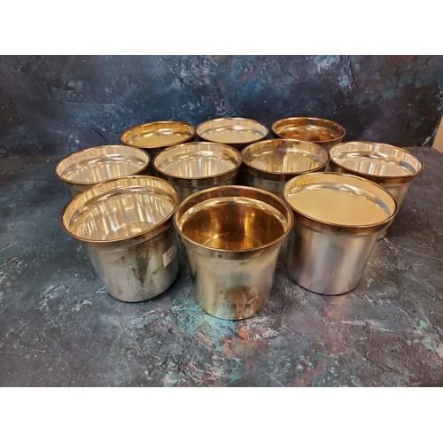 42 - A set of ten plated pots, 8cm high(VAT on Hammer price)