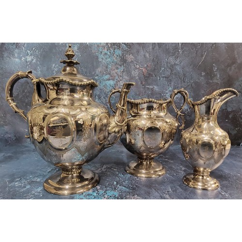 11 - A Victorian E.P.B.M. three piece coffee service, of pedestal ovoid form, embossed with ovals, engrav... 