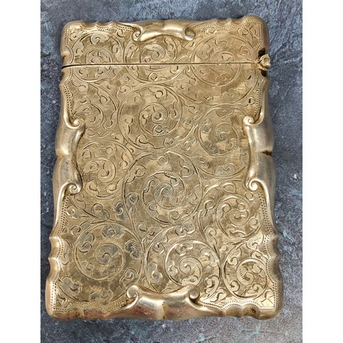 61 - An Edwardian silver rectangular card case, chased and engraved with foliate scrolls, hinged cover, v... 