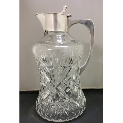 73 - A silver mounted claret jug, of waisted cylindrical form, slice cut, hinged cover, 25cm high, Birmin... 