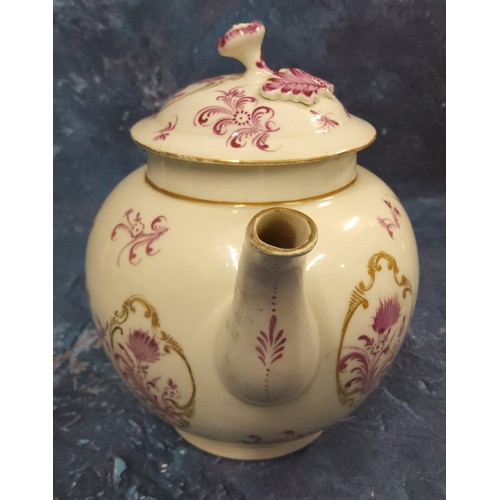 329 - A Worcester globular teapot and cover,  painted in Meissen style with puce flowers in gilt cartouche... 