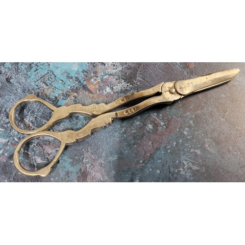 223 - A pair of Victorian silver grape shears, foliate wrapped handles, 18cm long, M Emanuel, London 1893,... 