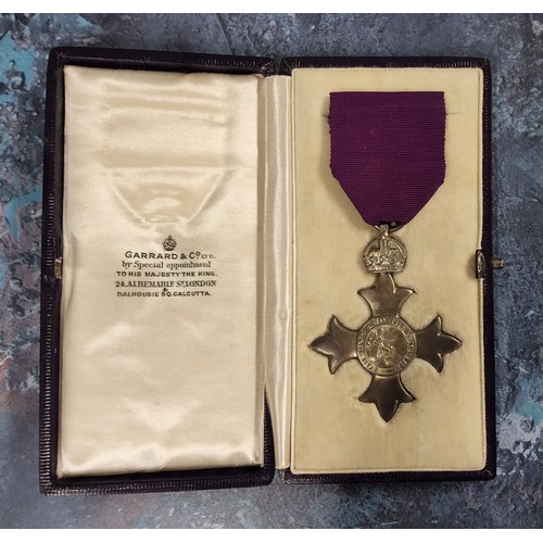 275 - The Most Excellent Order of the British Empire, a George VI frosted silver MBE badge, 1919 with purp... 