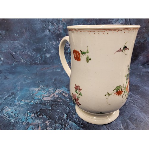 318 - A Plymouth baluster mug,  painted with colourful floral sprays and sprigs, crows foot border, 15.5cm... 