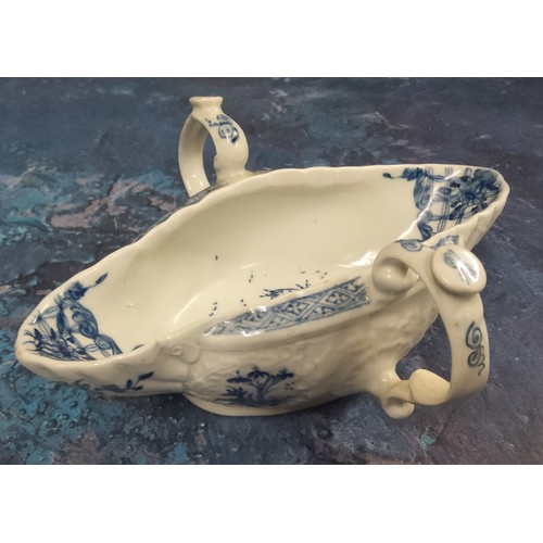 320 - A Worcester  double handled sauceboat,  lobed and moulded, painted with the Two-Handled Sauceboat La... 